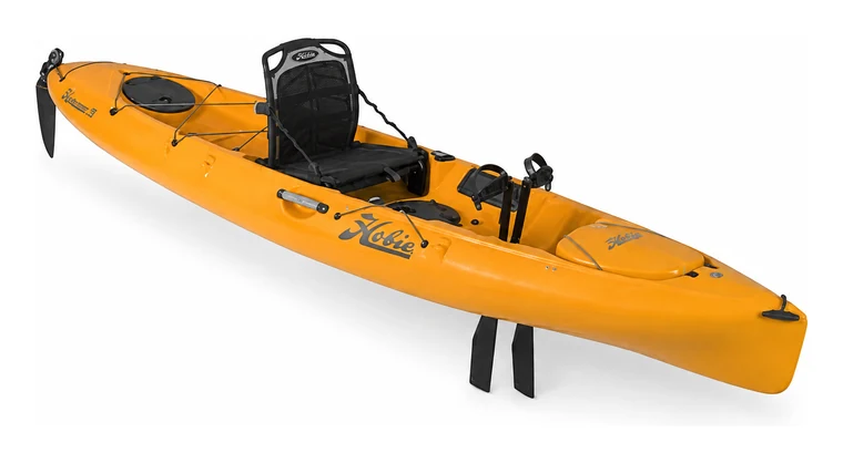 Hobie Mirage Revolution 13 in orange papaya, three-quarter view, showing the narrow 13-foot hull, bow-mounted rudder blade and the MirageDrive fins below the hull