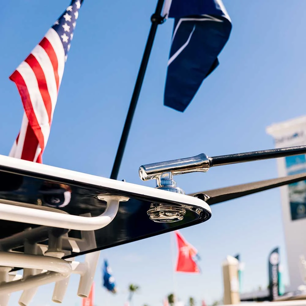 Gemlux Coastal outrigger pole and polished mount on a boat top